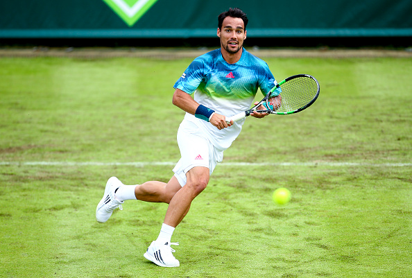 Fabio Fognini hits a volley at The Boodles at Stoke Park in London/Getty Images