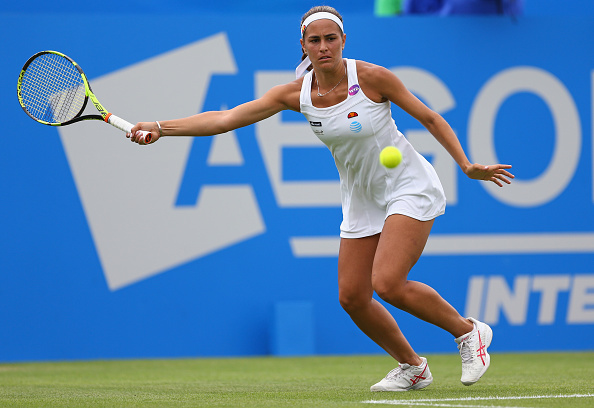 Puig keeps pegging the Frenchwoman back and closes out set in tiebreak | Photo: Steve Bardens/Getty Images