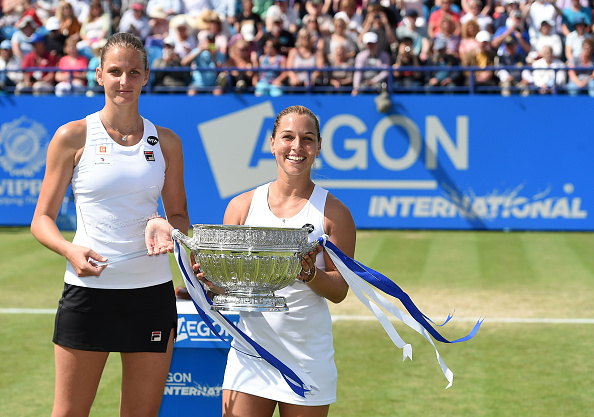 Runner-up Karolina Pliskova (left) and Cibulkova pose with their trophies after the conclusion of the final. Photo credit: Tom Dulat/Getty Images.