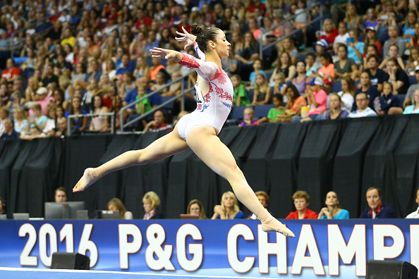 Aly Raisman performs on the floor exercise at the P&G Women's Gymnastics Championships in St. Louis/Getty Images