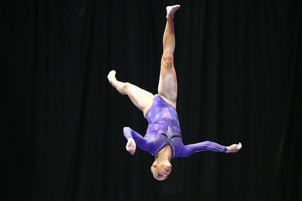 Alyssa Baumann performs on the balance beam at the P&G Women's Gymnastics Championships in St. Louis/Getty Images