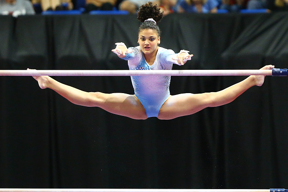 Laurie Hernandez performs on the uneven bars at the P&G Women's Gymnastics Championships in St. Louis/Getty Images