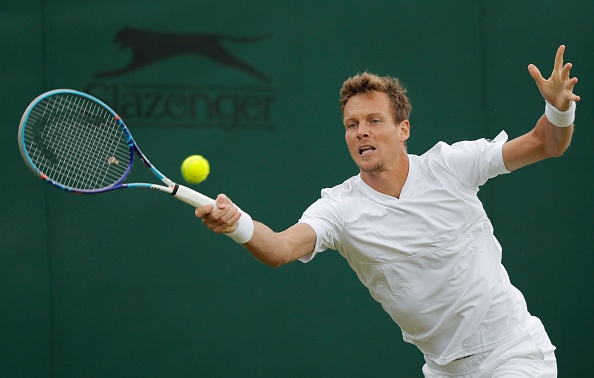 Tomas Berdych hits a forehand at Wimbledon/Getty Images