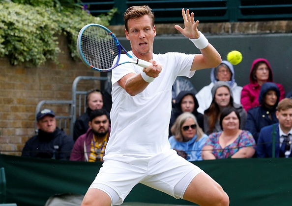 Tomas Berdych hits a forehand at Wimbledon/Getty Images