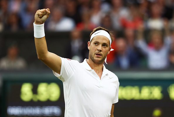 Willis celebrates winning his first game of the match (photo:getty)