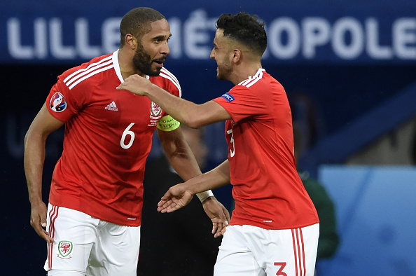 Ashley Williams and Neil Taylor celebrate after the former's goal. (Photo: MIGUEL MEDINA/AFP/Getty Images)