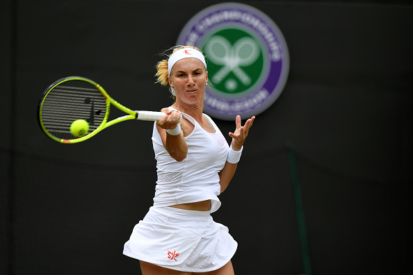 Svetlana Kuznetsova hits a forehand at Wimbledon/Getty Images