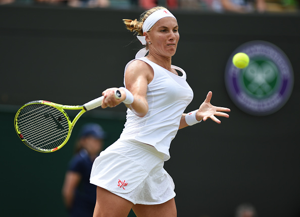 Svetlana Kuznetsova strikes a forehand at Wimbledon/Getty Images