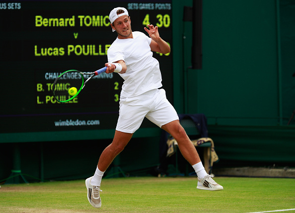 Lucas Pouille plays a forehand/Photo: Adam Pretty/Getty Images