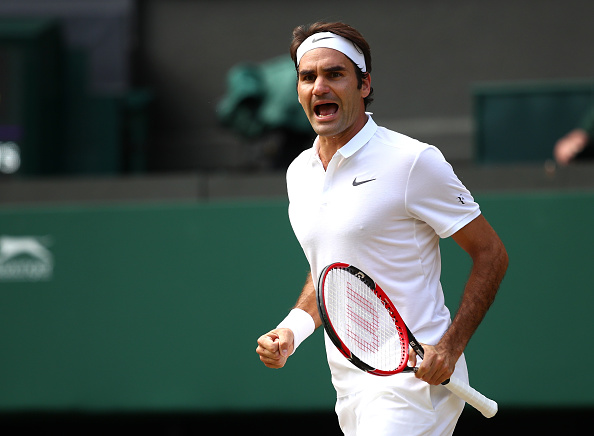 Federer lets out an enormous roar to his box after forcing a fifth set. Credit: Clive Brunskill/Getty Images