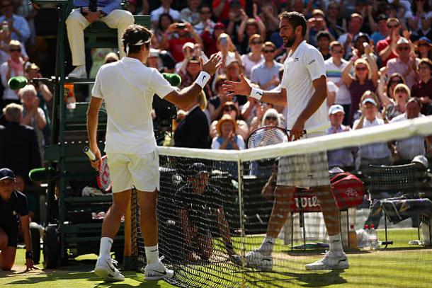 Roger Federer and Marin Cilic meet after their five-set quarterfinal encounter last year (Getty/Clive Brunskill)