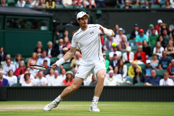 Andy Murray plays a forehand to Jo-Wilfried Tsonga in their quarterfinals match (Photo: Julian Finney/Getty Images)