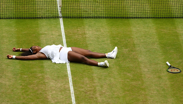 Williams collapsed to the ground in celebration (photo:getty)