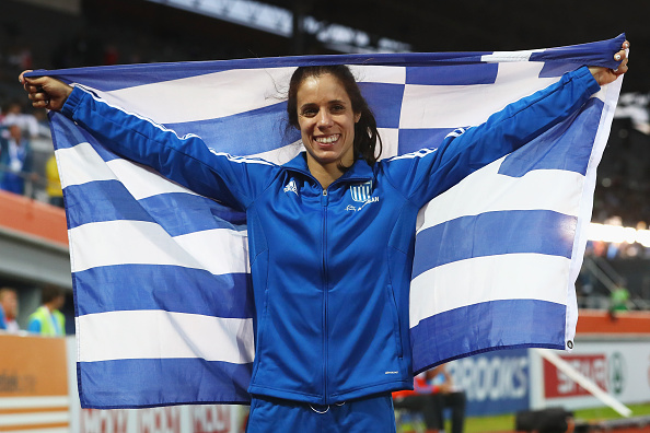 Ekaterini Stefanidi with the Greek flag after winning the European Championships. Photo:Getty/Dean Mouhtaropoulos