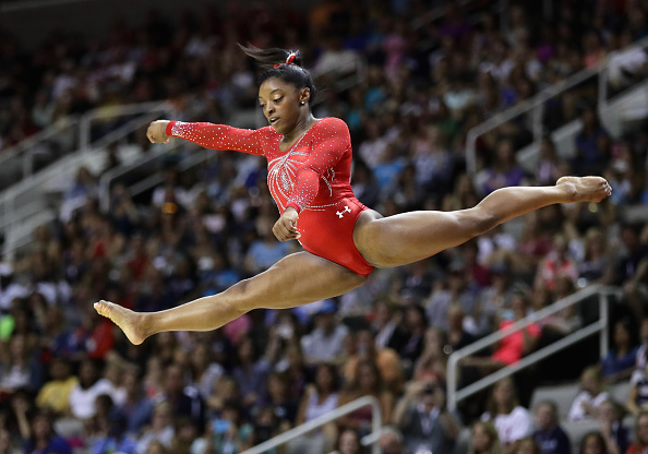 Simone Biles performs on the balance beam at the U.S. Women's Gymnastics Olympic Trials in San Jose/Getty Images