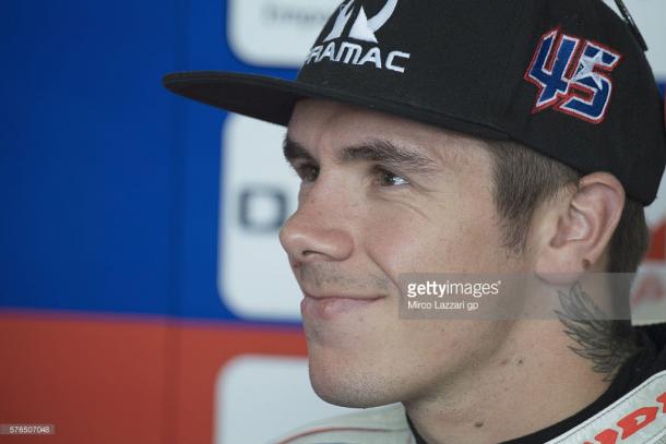 Scott Redding amused as he watched a replay of his crash on the monitors from his put garage - Getty Images