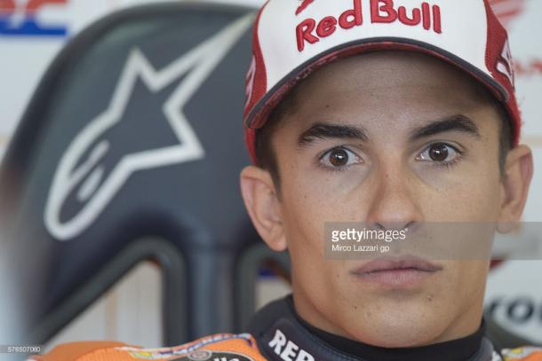 Marquez pondering in his pit garage - Getty Images