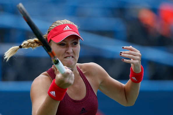 Mladenovic also saves break point to keep the match on serve | Photo: Matt Hazlett/Getty Images