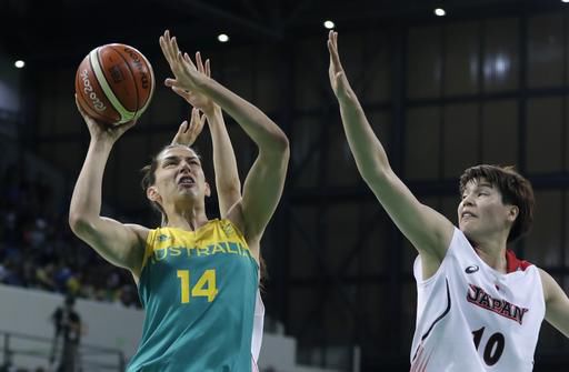 Australia center Marianna Tolo (14) shoots as Japan forward Ramu Tokashiki defends during the first half of a women's basketball game at the Youth Center at the 2016 Summer Olympics in Rio de Janeiro, Brazil, Thursday, Aug. 11, 2016. (AP Photo/Carlos Osorio)  Car