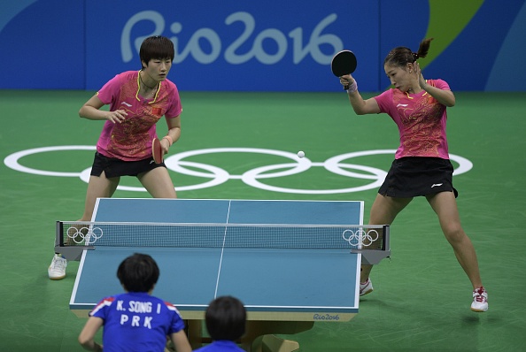 Easy for China in the doubles | Photo: Juan Mabromata/Getty Images