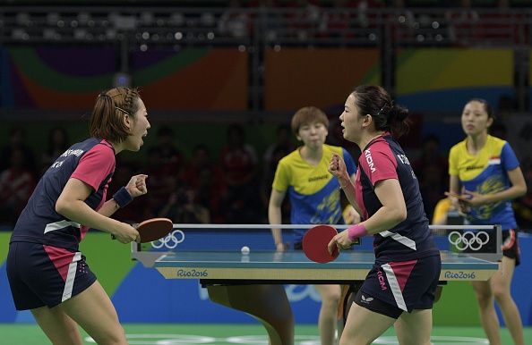 Koreans edge the doubles thriller | Photo: Juan Mabromata/Getty Images