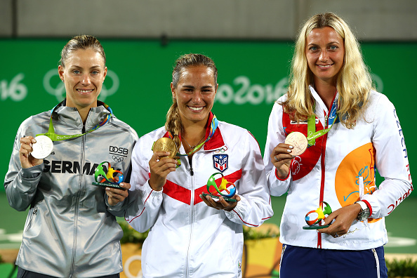 Kvitova with fellow Olympic medal winners, silver medallist Angelique Kerber (left) and gold medallist Monica Puig (centre) after the conclusion of the final at this year's Rio Olympics. Photo credit: Clive Brunskill/Getty Images.