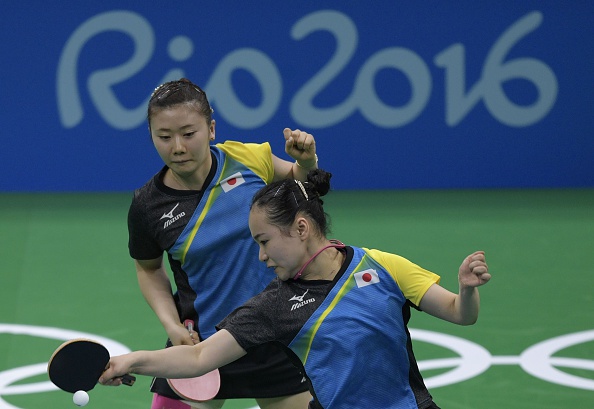Japan were put through another battle in the doubles | Photo: Juan Mabromata/Getty Images