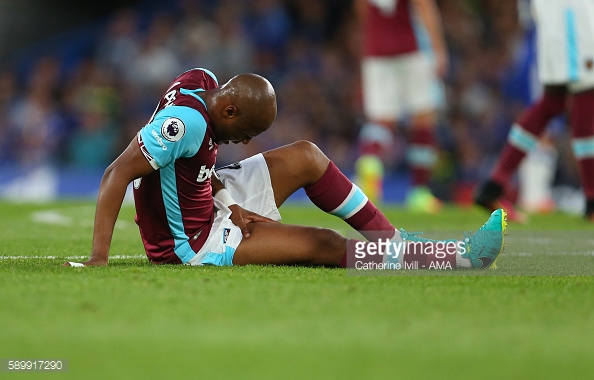 Above: Andre Ayew down injured in West Ham's opening day defeat to Chelsea | Photo: Getty Images 