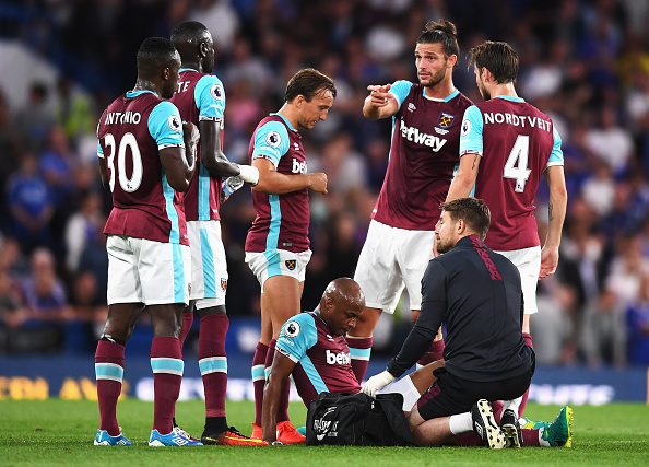 Above: Andre Ayew laying injured on the Stamford Bridge after West Ham's 2-1 defeat to Chelsea |Photo: Getty Images