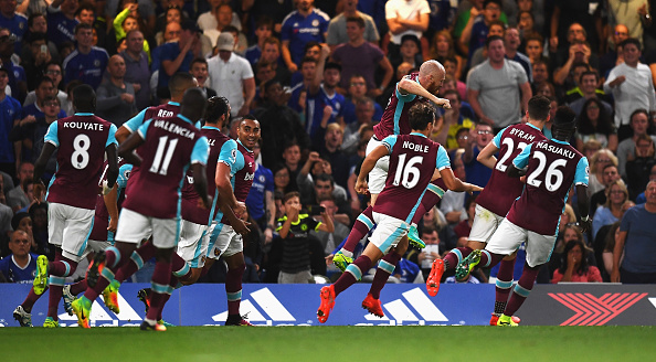 Above: James Collins celebrating his goal in West Ham's 2-1 defeat to Chelsea | Photo: Getty Images