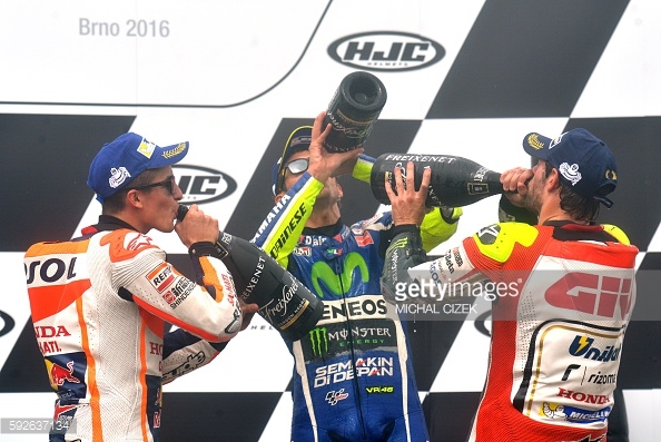 Bottom's up... Crutchlow will definitely be wetting the baby's head tonight and celebrating his first ever MotoGP win - Getty Images