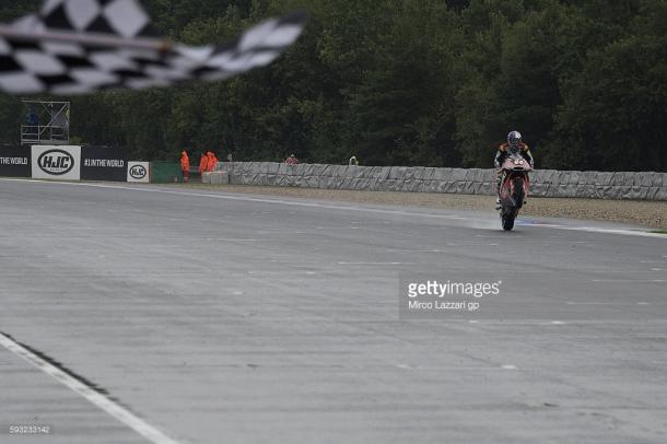 Folger celebrating winning a wet race with a wheelie in Brno - Getty Images