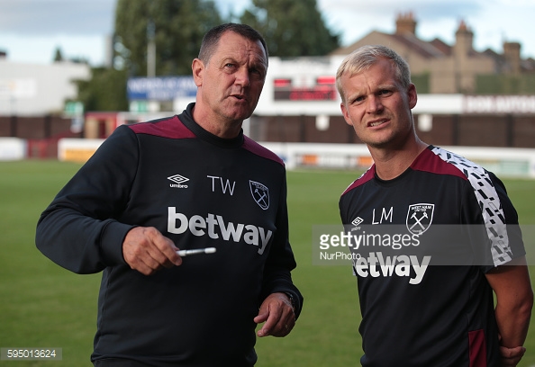 Above: West Ham academy coach Liam Manning with Terry Westley | Photo: Getty Images