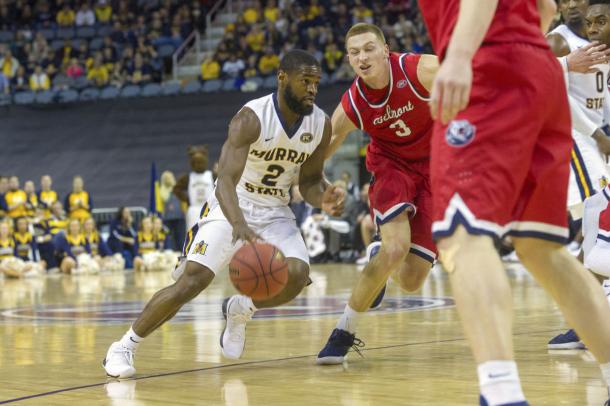 Murray State's Jonathan Stark drives past Belmont's Austin Luke in the Ohio Valley championship game/Photo: 