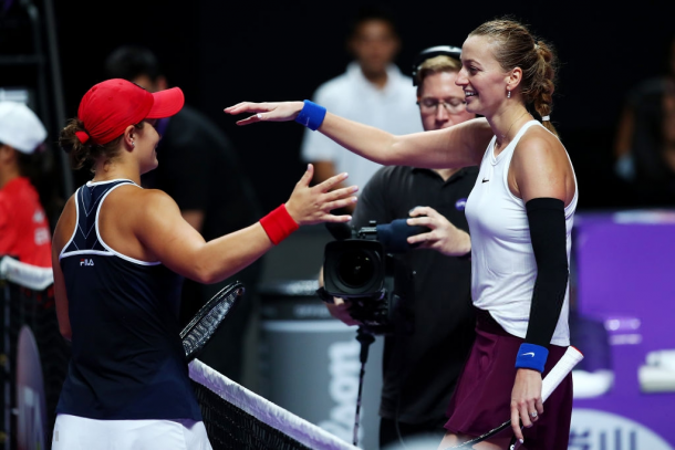 Kvitova and Barty share a nice hug at the net | Photo: Clive Brunskill