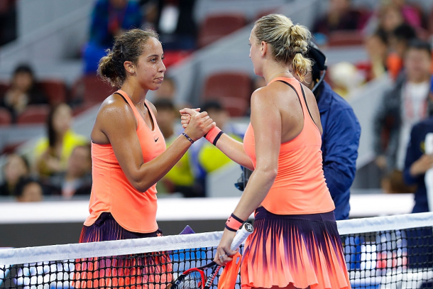 Keys (left) and Kvitova (right) embrace each other at that net after their quarterfinal clash in Beijing 2016, their most recent one. Photo: Lintao Zhang/Getty Images.