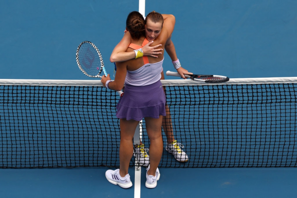 Kvitova and Sakkari share a nice hug after the match | Photo: Cameron Spencer