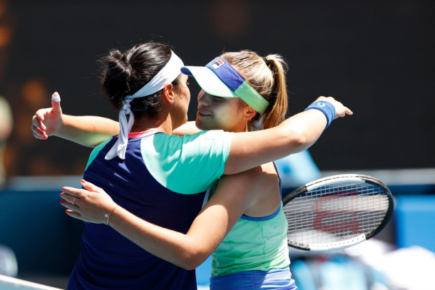 The two surprise quarterfinalists in Melbourne share a warm hug after the match | Photo: Fred Lee