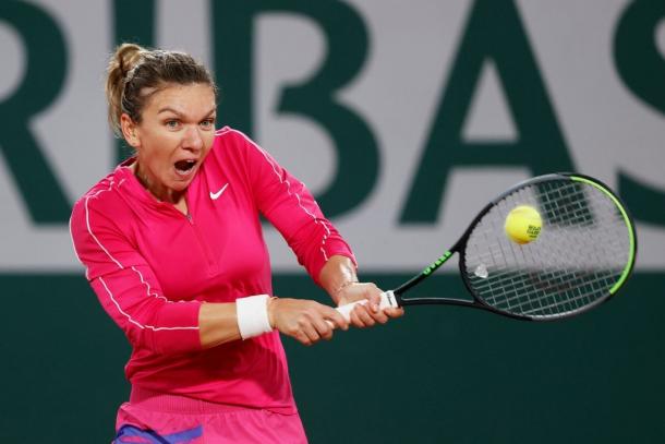 Halep hits a backhand in her destruction of her American opponent Friday. Photo: Clive Brunskill