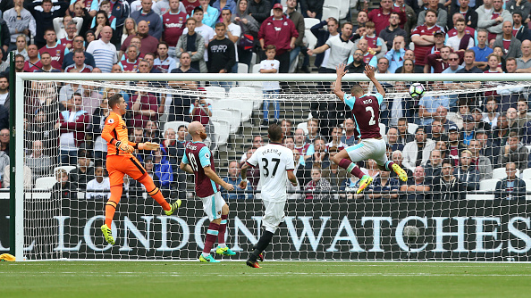 Above: Troy Deeney's effort hitting the back of the net in West Ham's 4-2 defeat to Watford |Photo: Getty Images