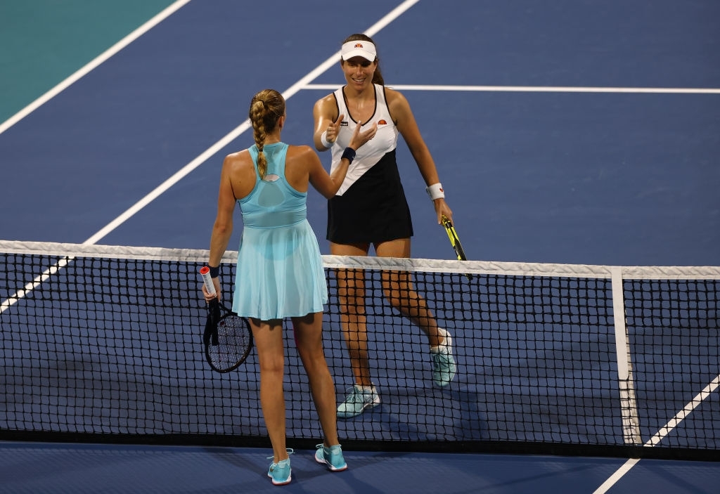 Both players embrace each other at the net after the conclusion of what was their sixth overall encounter. Photo: Mark Brown