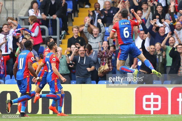 Scott Dann celebrates scoring against Stoke City - his last league appearance before hobbling off against Southampton in the EFL Cup | Photo: Getty images / Warren Little