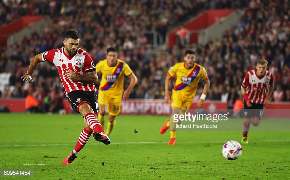 Austin tucks away his first half penalty | Photo: Getty images / Richard Heathcote