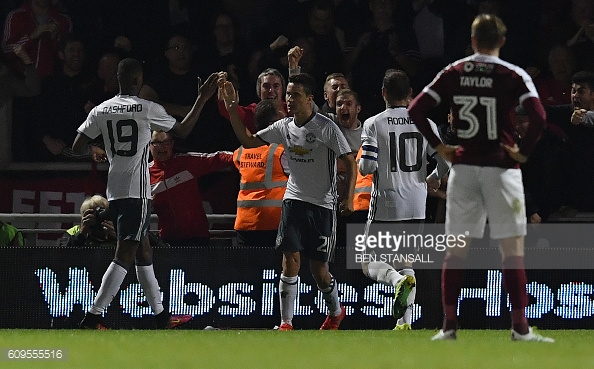 The Manchester United players celebrate Herrer