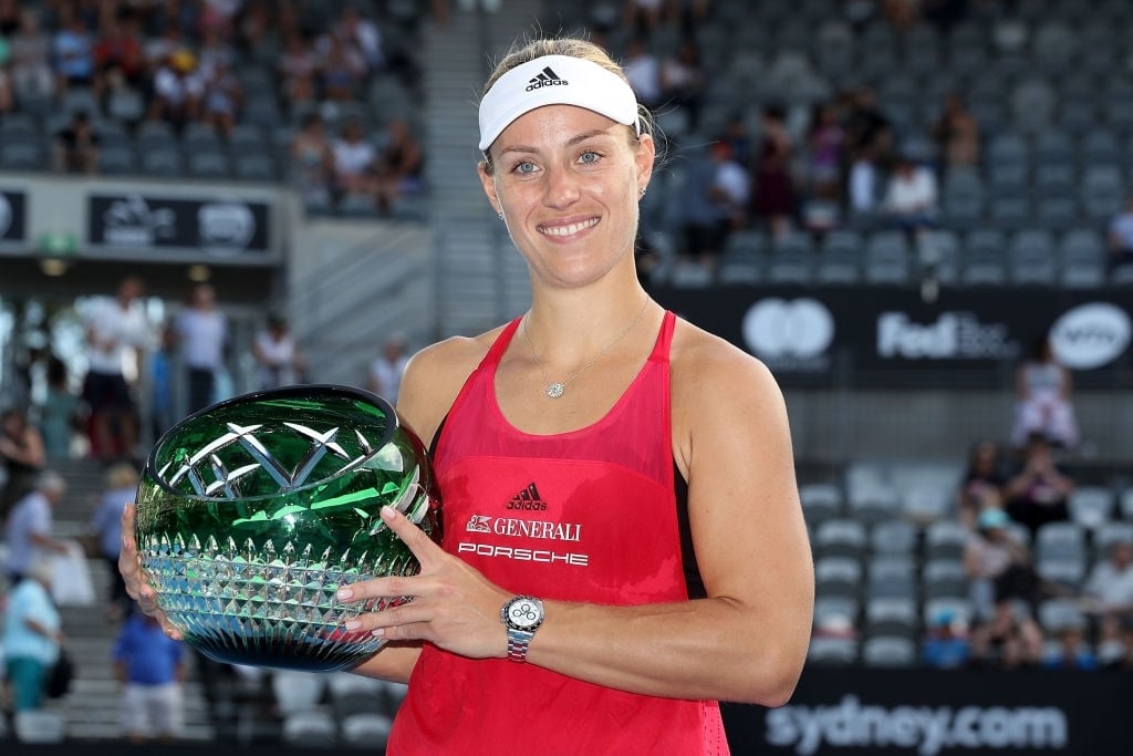 Kerber poses with her Sydney trophy after capturing the title here for the first time, in her second try. Photo: 