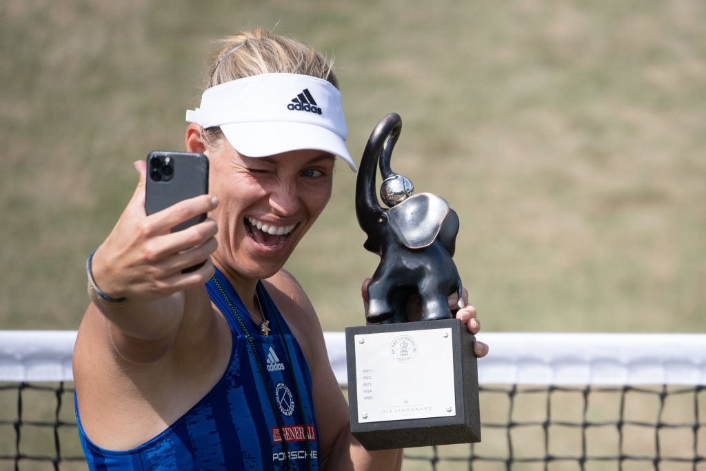 Kerber capped off her week at home on grass in Bad Homburg Open with her 13th career title, and third on home soil. Photo: 