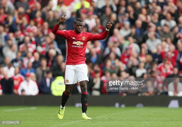 Pogba celebrating his first goal for United against Leicester | Photo: James Baylis - AMA / Getty Images