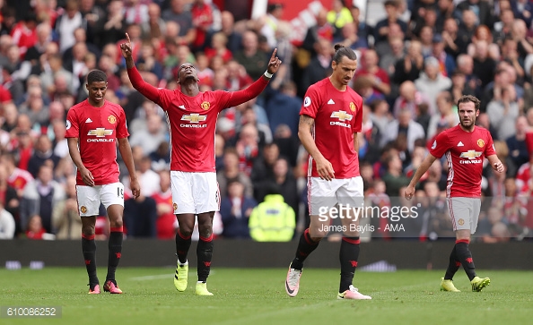 Above: Paul Pogba celebrating his goal in Manchester United's 4-1 win over Leicester City | Photo: Getty Images