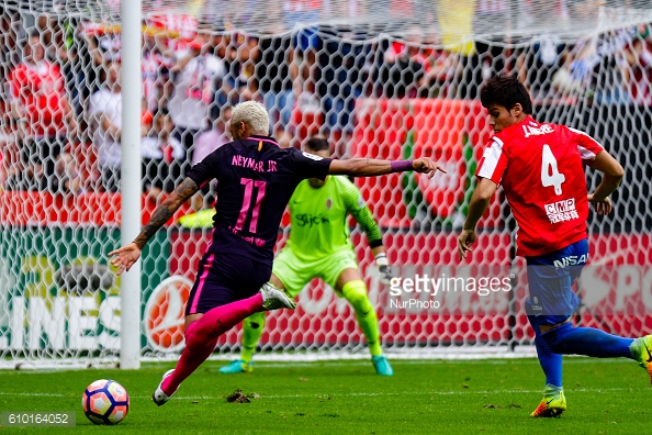 Above: Neymar firing home one of his two goals in Barcelona's 5-0 win over Sportin Gijon | Photo: Getty Images