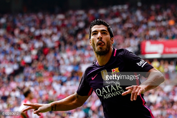 Above: Luis Suarez celebrating his goal in Barcelona's 5-0 win over Sporting Gijon | Photo: Getty Images